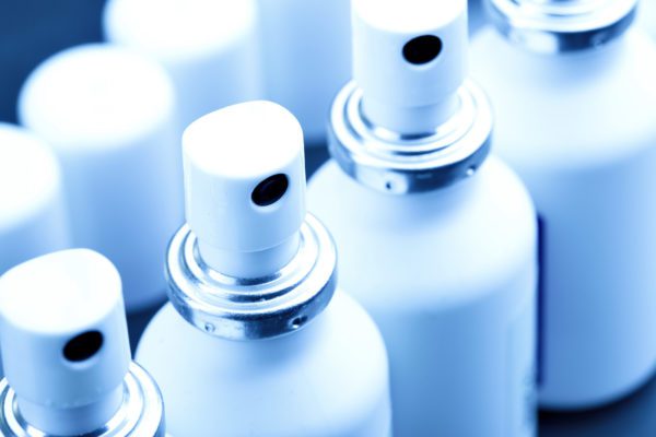 Close up of aerosol can in a production line